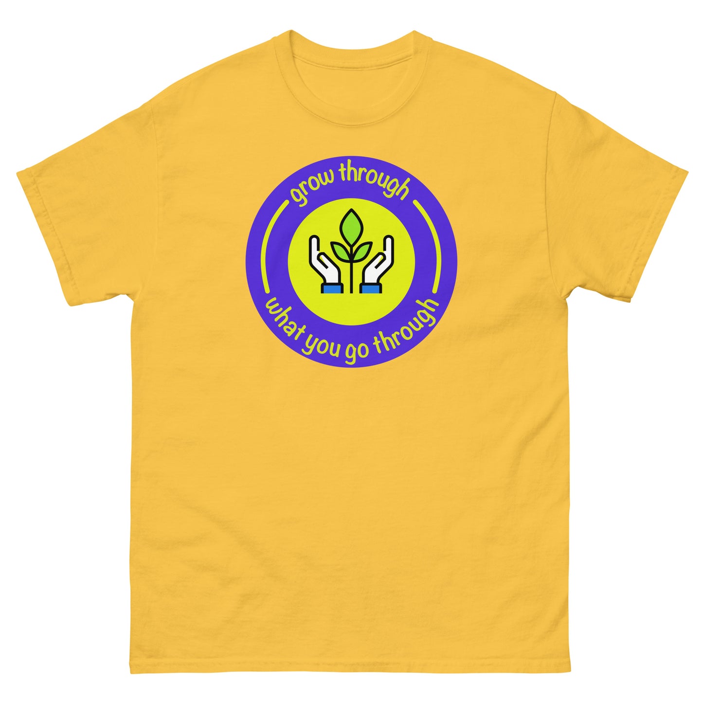Yellow t-shirt with a circular design featuring hands, a leaf, and text on a white background