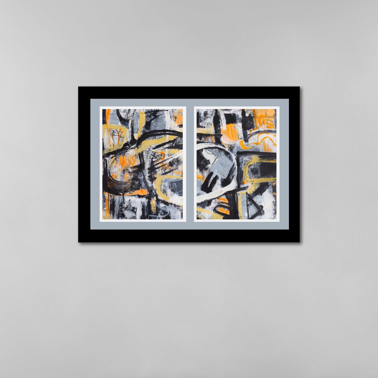 Single framed diptych abstract art piece with black, yellow, and gray colors on a gray wall.