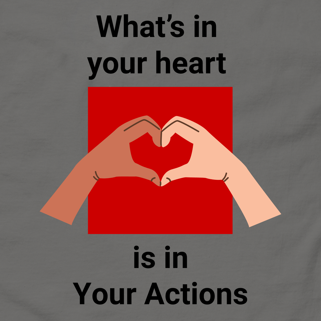 Flat lay of charcoal unisex tee with two hands forming a heart design - What's In Your Heart is in your actions by Ken Law Art