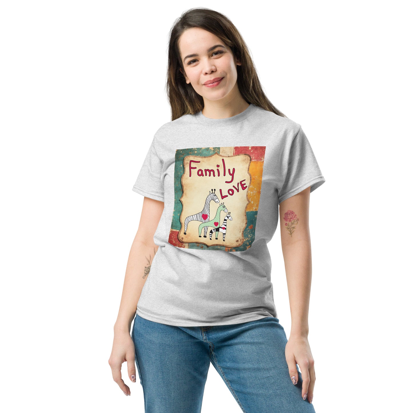 Woman wearing a gray t-shirt with a graphic design of giraffes and text on a white background