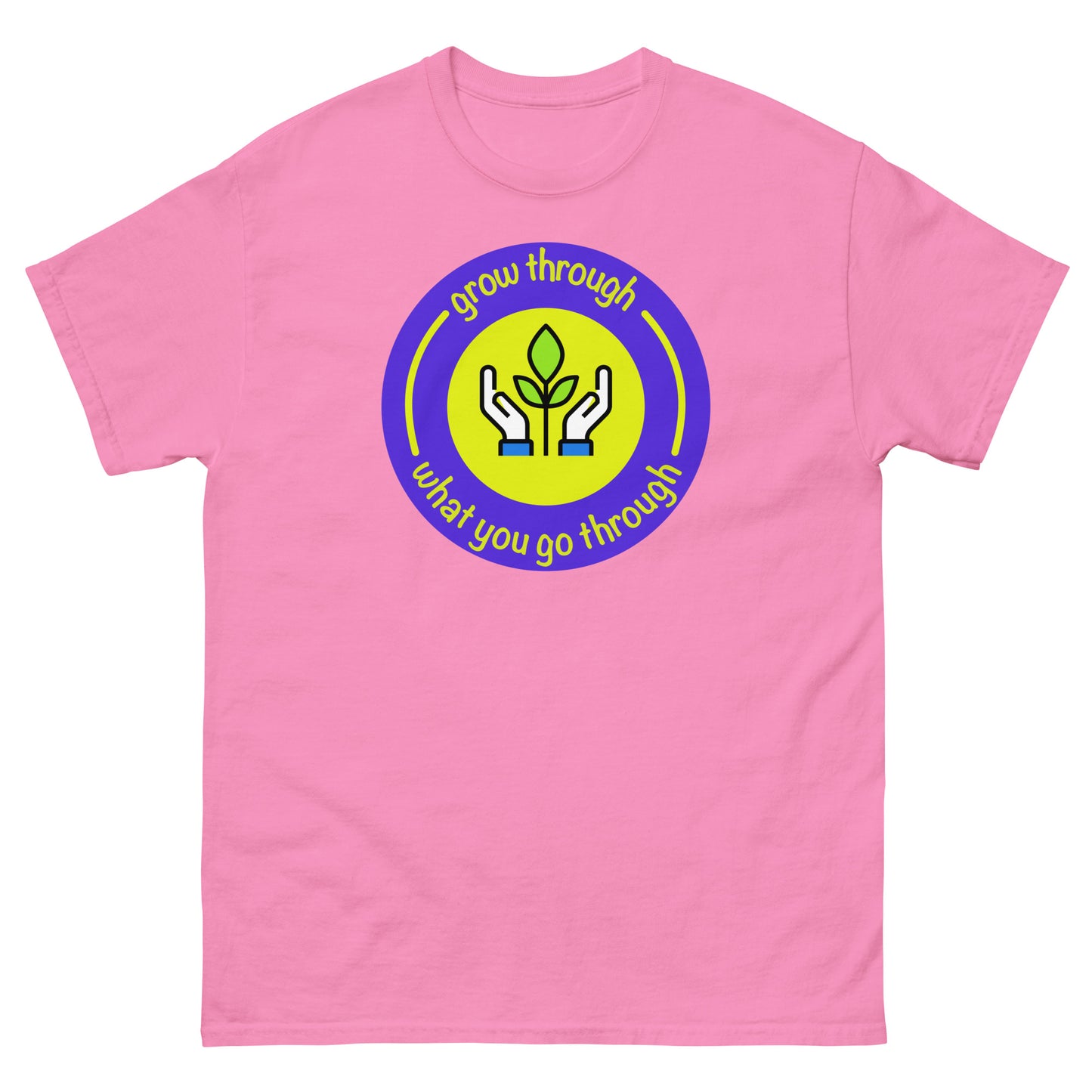 Pink t-shirt with a circular design featuring hands and a leaf on a white background