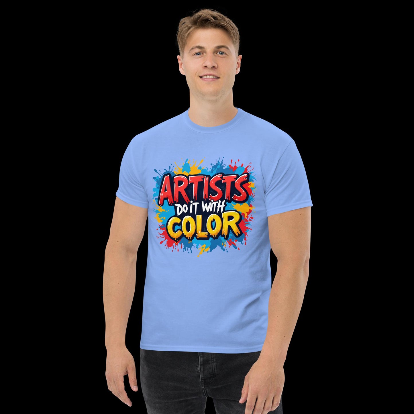 Person wearing a blue t-shirt with 'Artists Do It With Color' text and colorful design.