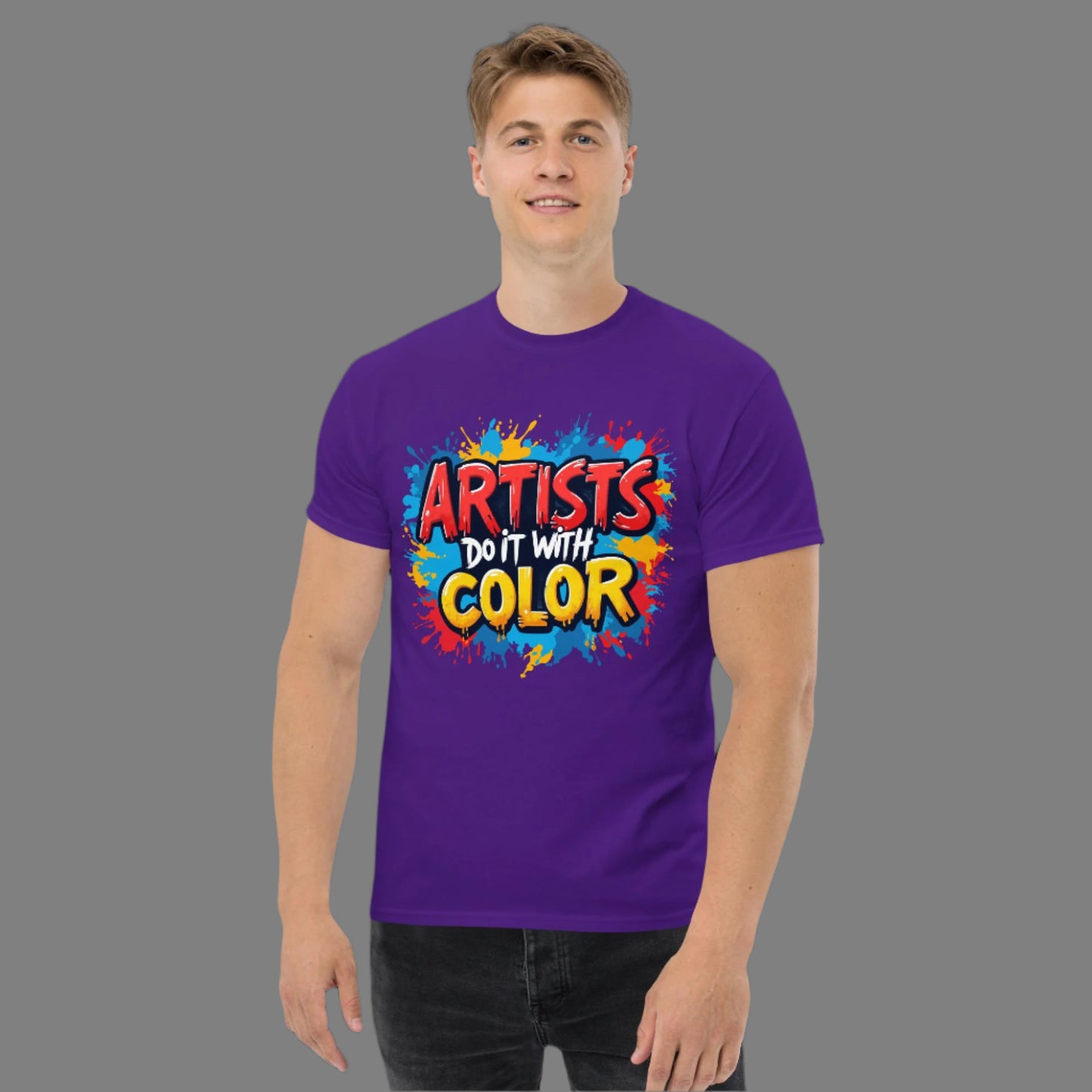 Person wearing a purple t-shirt with 'Artists Do It With Color' text and colorful design.