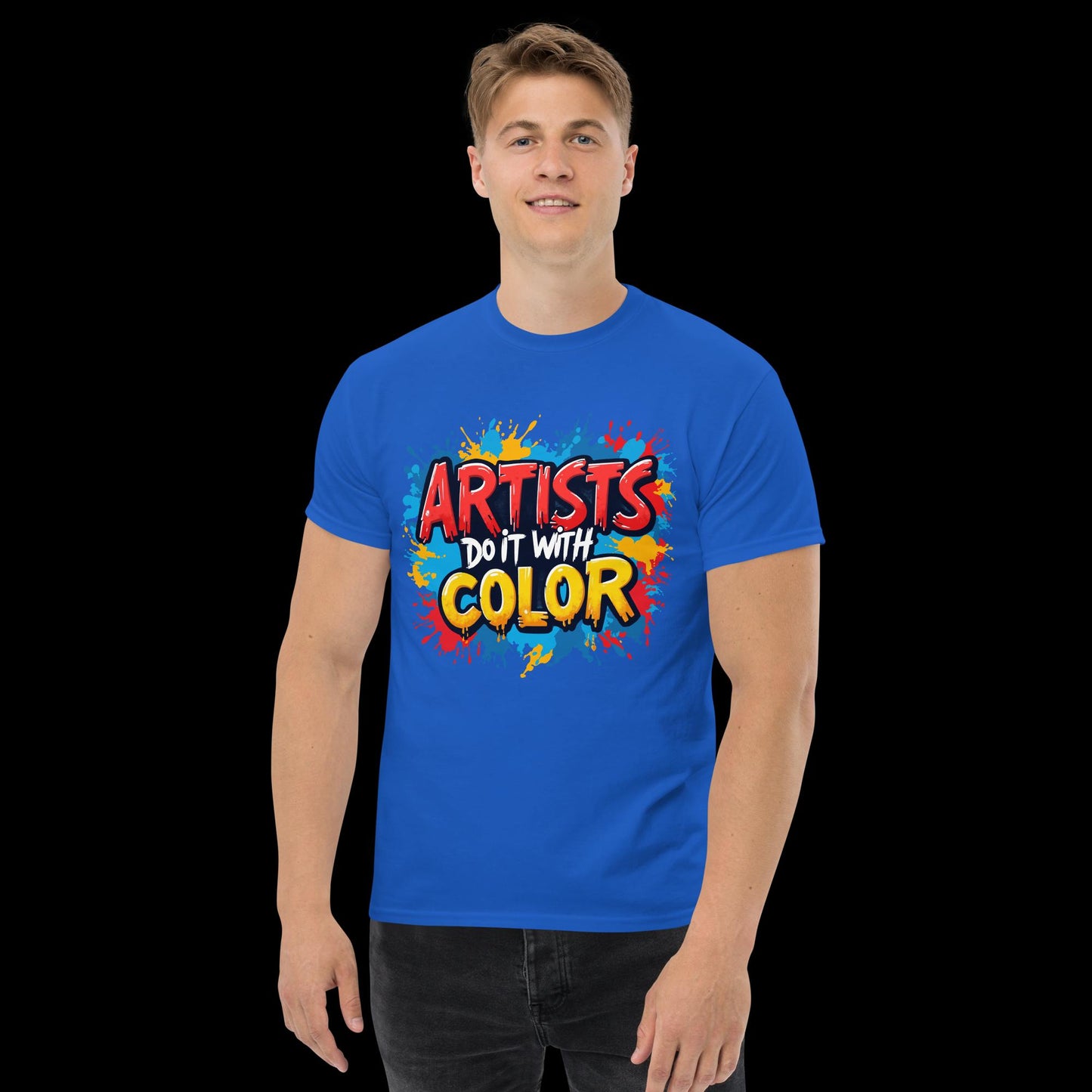 Person wearing a blue t-shirt with 'Artists Do It With Color' text and graphics on a black background